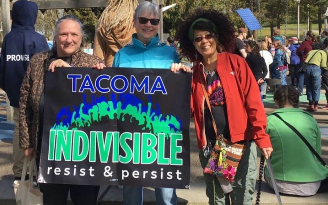 Photo from Tacoma Youth Climate Street with Louisa, Ellen, and Damita.