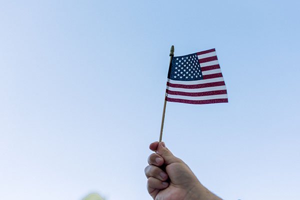 Freedom - Hand waving flag.