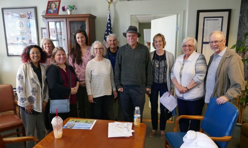 Photo of Indivisible Tacoma members meeting with Maria Cantwell.