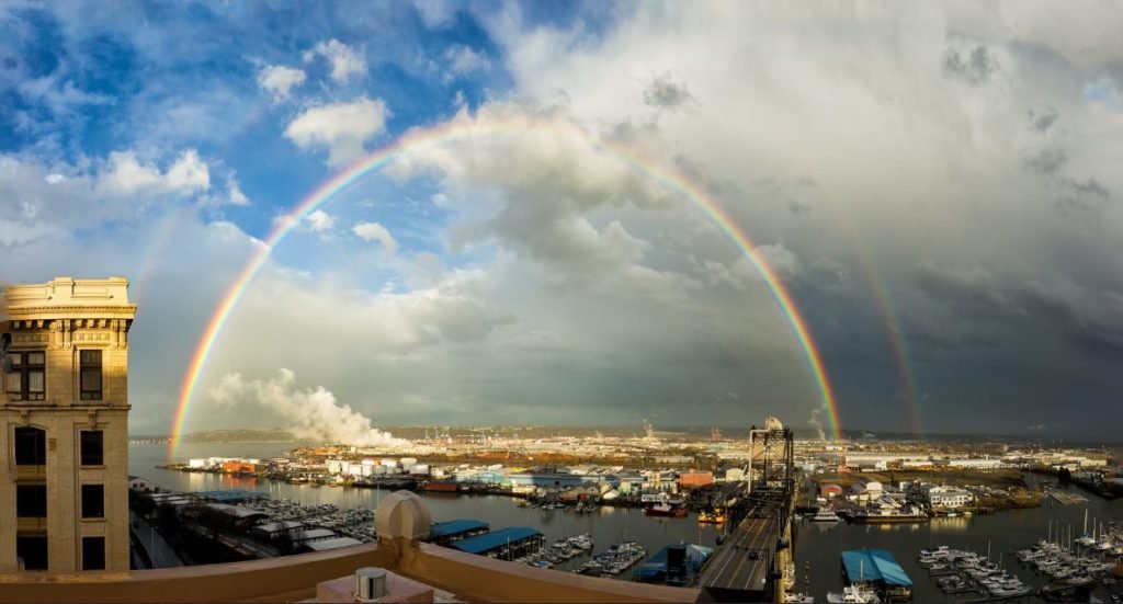 Photo of double-rainbow over the Port of Tacoma. Do we need PSE's liquid natural gas plant in our future?